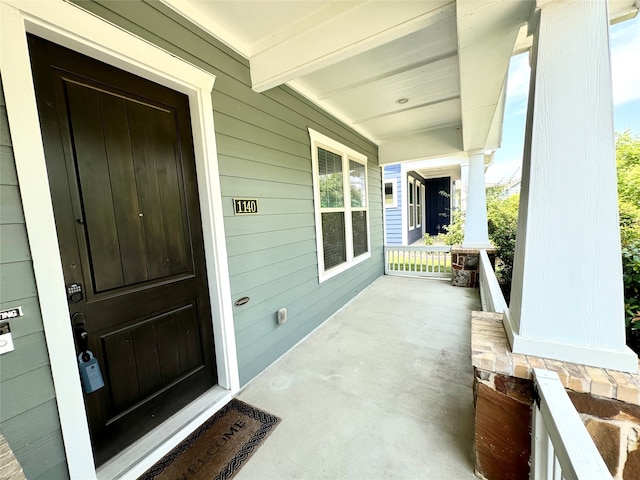 entrance to property with covered porch