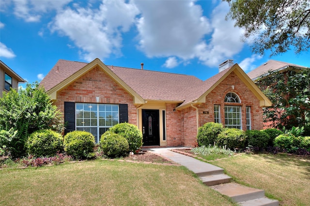 view of front of house with a front yard