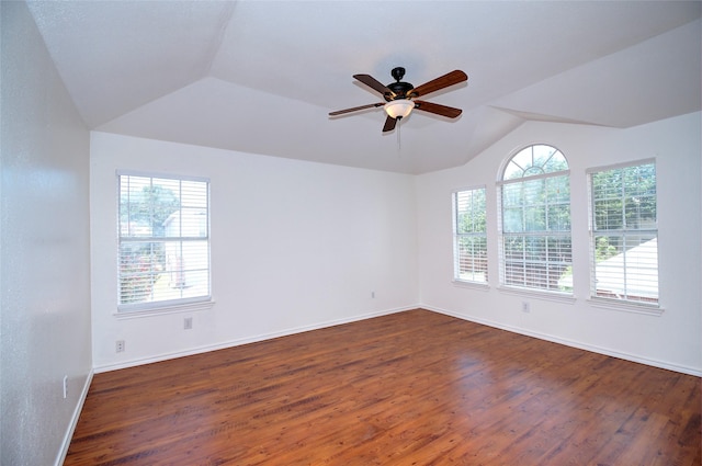 unfurnished room featuring ceiling fan, lofted ceiling, and dark wood-type flooring