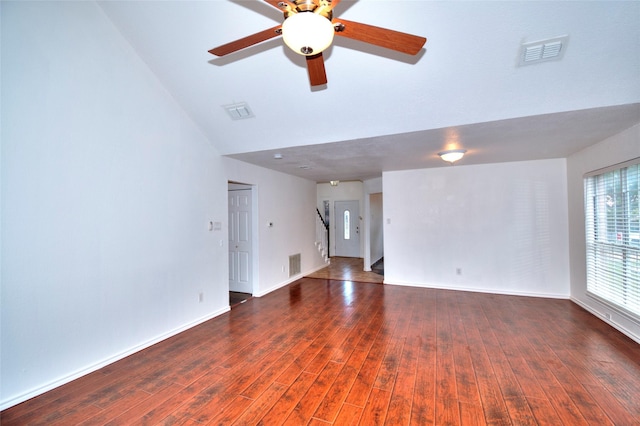 unfurnished living room featuring dark hardwood / wood-style floors, ceiling fan, and lofted ceiling