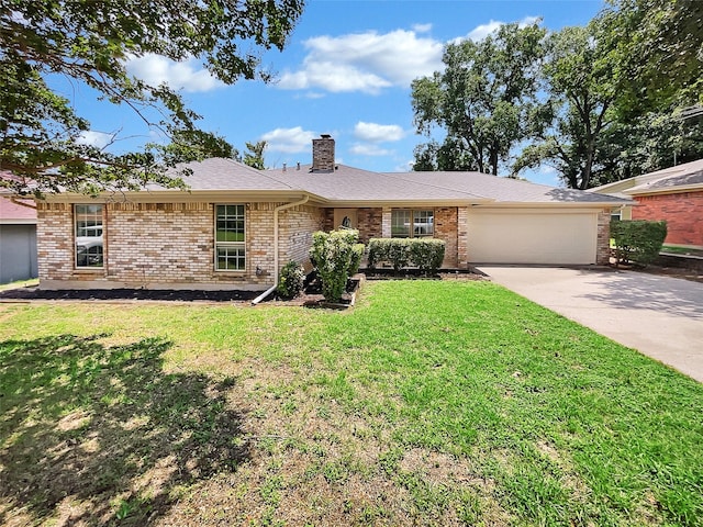 ranch-style house featuring a garage and a front yard