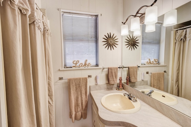 bathroom featuring vanity with extensive cabinet space