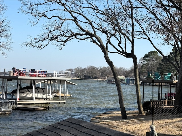 dock area featuring a water view