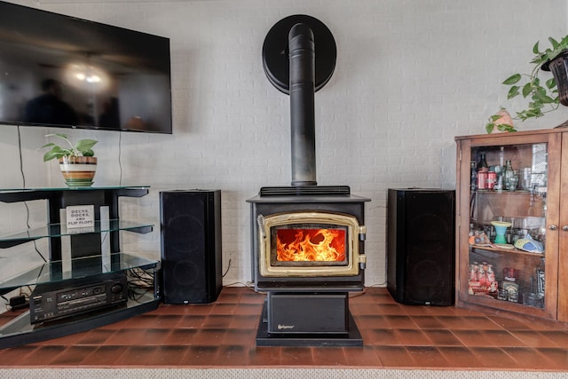 living room with a wood stove