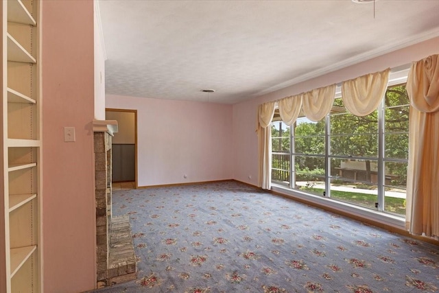 unfurnished room featuring a textured ceiling