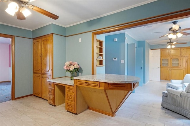 kitchen featuring ornamental molding, ceiling fan, and kitchen peninsula