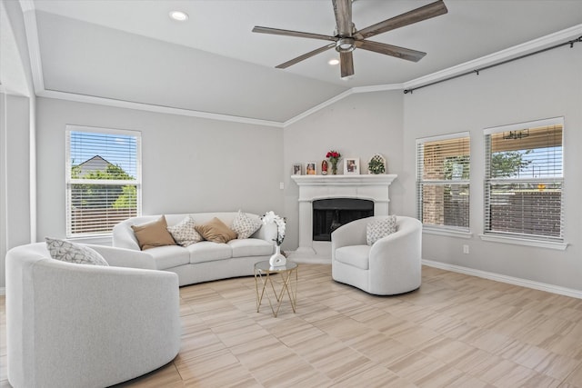 living room with vaulted ceiling, ornamental molding, and ceiling fan