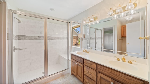 bathroom with walk in shower, tile patterned floors, and vanity