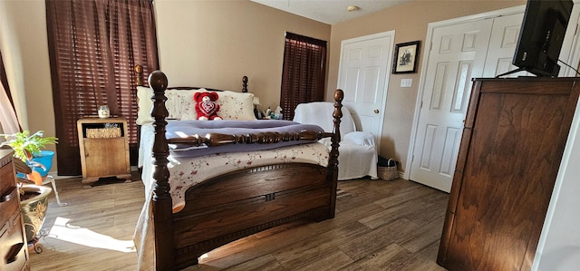 bedroom featuring hardwood / wood-style flooring