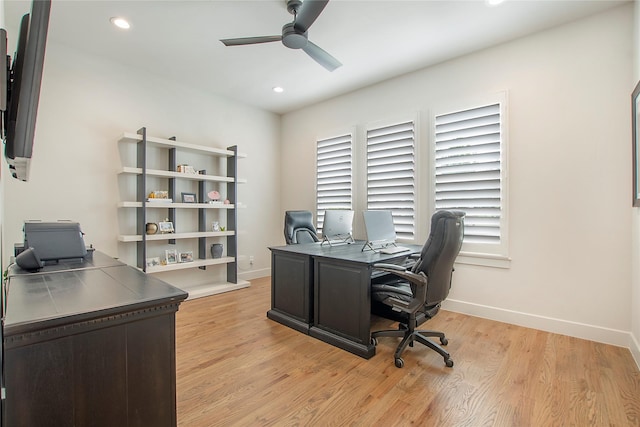 office area featuring ceiling fan and light hardwood / wood-style floors