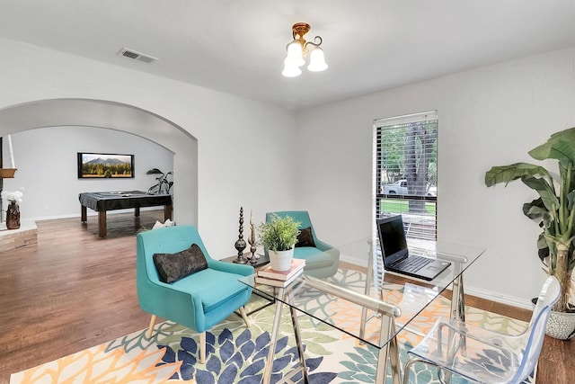 living area featuring hardwood / wood-style floors