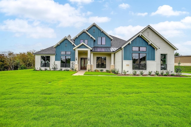 view of front of property with a front lawn