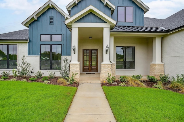 entrance to property with a yard