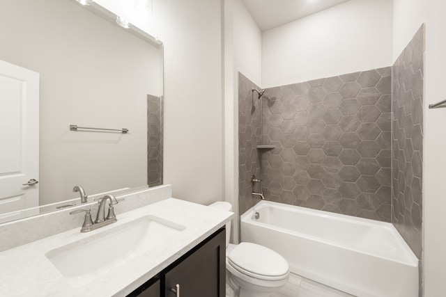 full bathroom featuring vanity, toilet, and tiled shower / bath