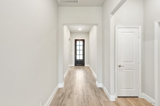 hallway featuring light hardwood / wood-style floors