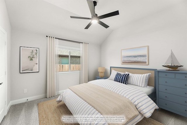 carpeted bedroom featuring lofted ceiling and ceiling fan