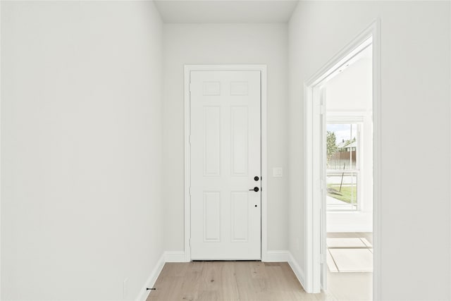 doorway with light hardwood / wood-style floors