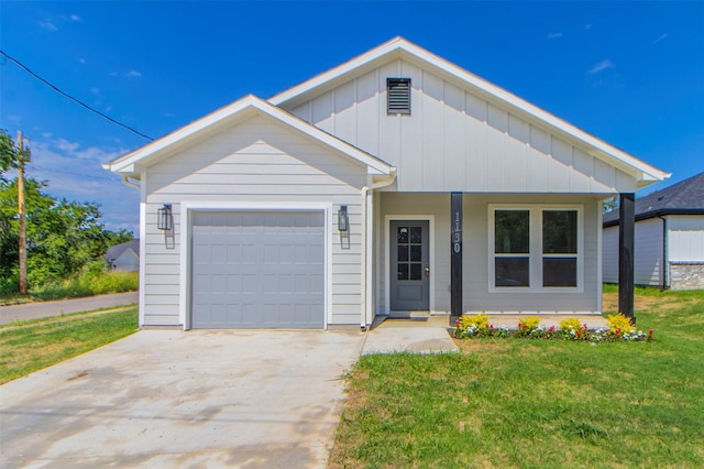 view of front of home featuring board and batten siding, concrete driveway, an attached garage, and a front lawn