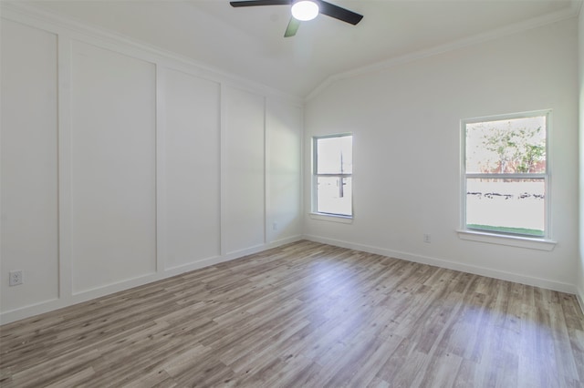 empty room with light hardwood / wood-style floors, crown molding, and ceiling fan