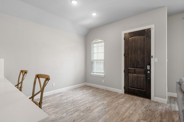 living room with ceiling fan and light hardwood / wood-style floors