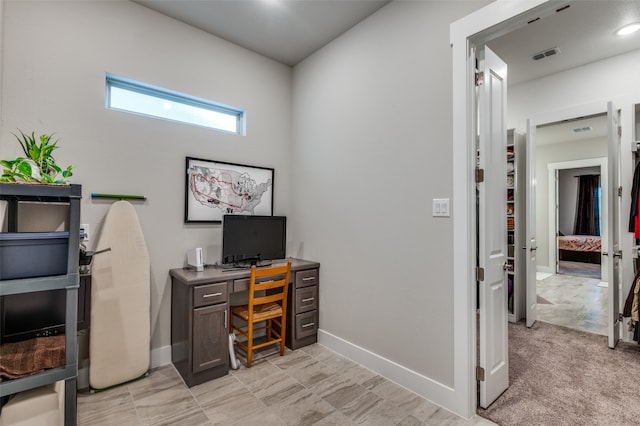 office featuring light colored carpet