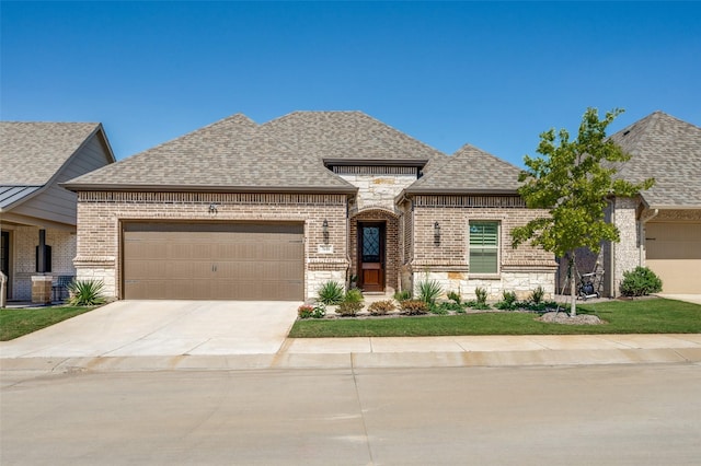 french country style house with a garage