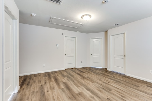 unfurnished room featuring light wood-type flooring