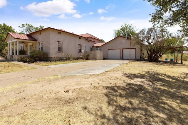 view of side of property with a garage