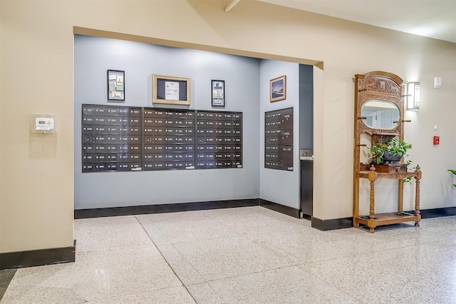 view of home's community featuring mail boxes