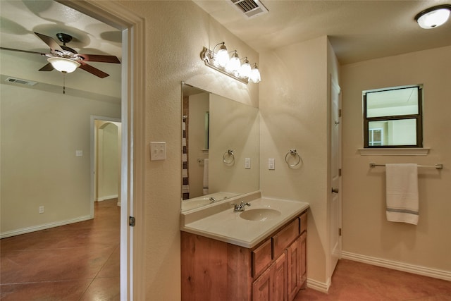 bathroom with vanity, tile patterned floors, and ceiling fan