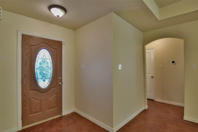 foyer featuring tile patterned floors