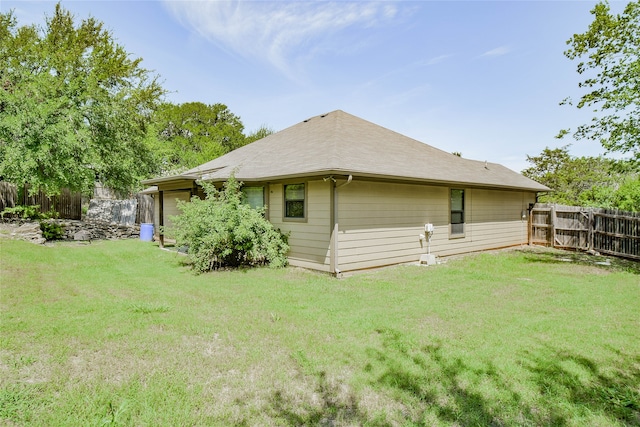 exterior space with a yard