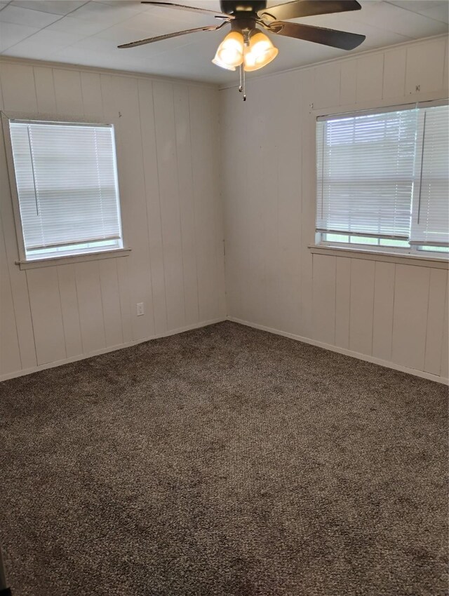 carpeted empty room with ceiling fan