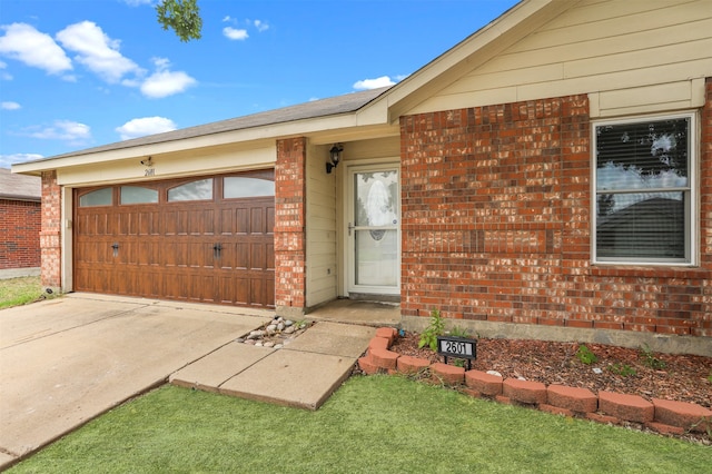 property entrance with a garage