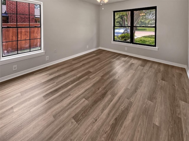 spare room featuring hardwood / wood-style flooring