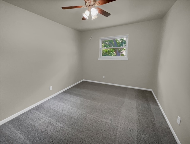 unfurnished room featuring ceiling fan and carpet floors