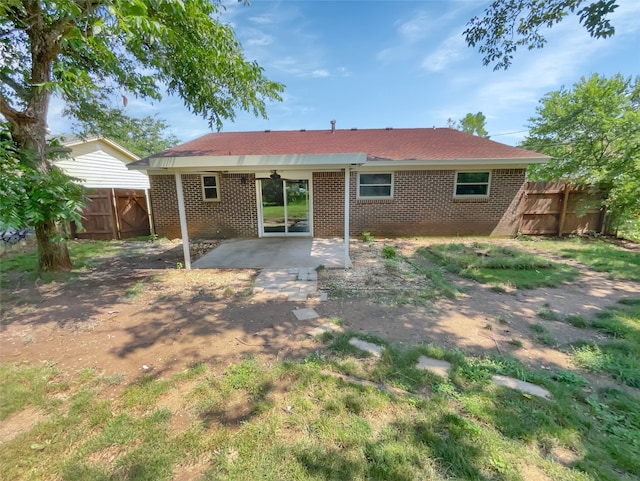 rear view of property with a patio area