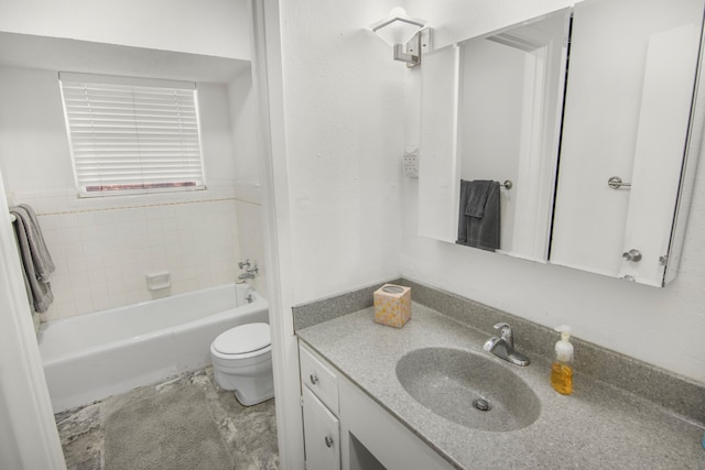 full bathroom featuring toilet, vanity, and tiled shower / bath