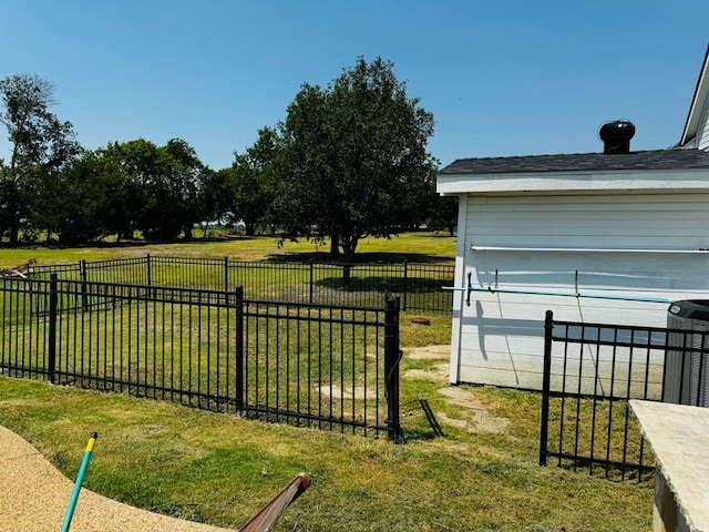 view of yard featuring central AC