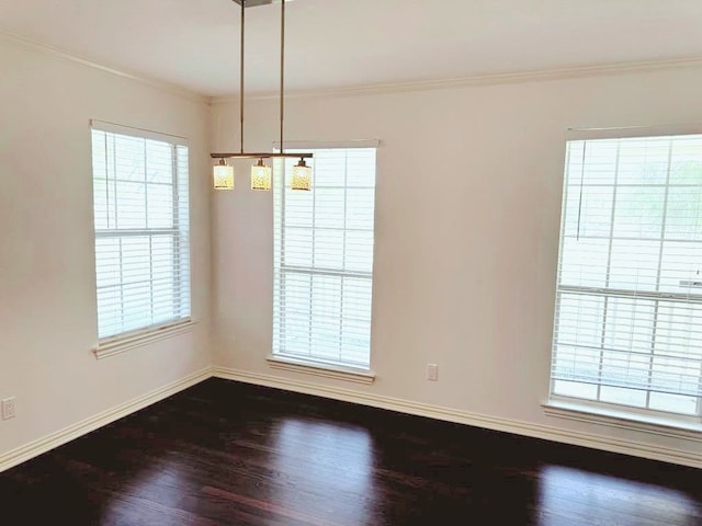 unfurnished room with dark hardwood / wood-style flooring and ornamental molding