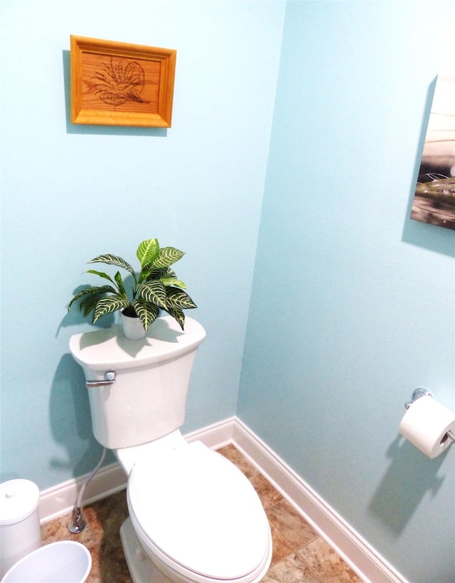 bathroom featuring toilet