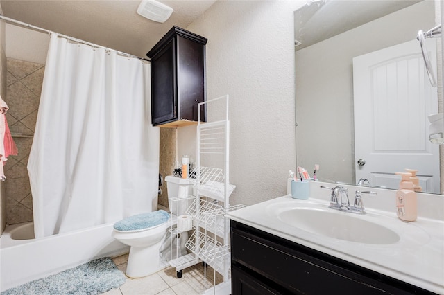 full bathroom featuring toilet, vanity, tile patterned floors, and shower / tub combo with curtain