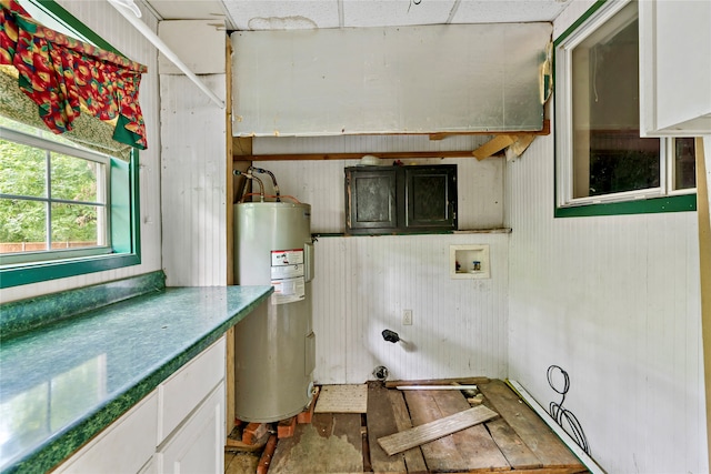 laundry room featuring hookup for a washing machine and electric water heater