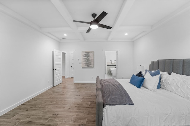 bedroom with ensuite bath, ceiling fan, beamed ceiling, and coffered ceiling