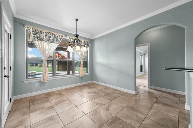 unfurnished dining area featuring light tile patterned floors, a chandelier, and ornamental molding