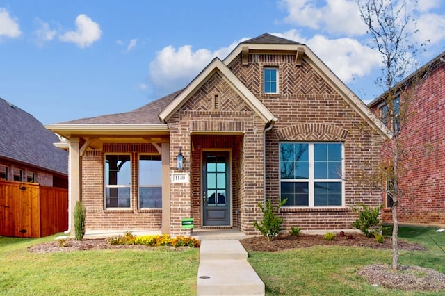 view of front facade with a front lawn