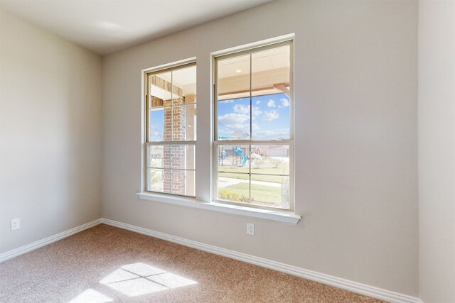 view of carpeted spare room