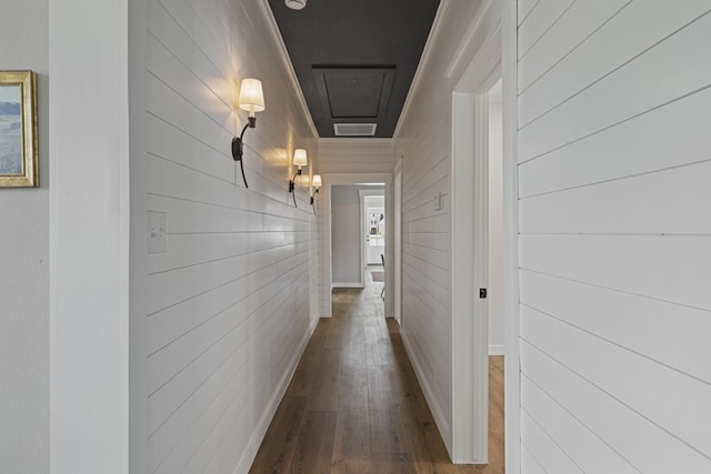 corridor featuring wood-type flooring