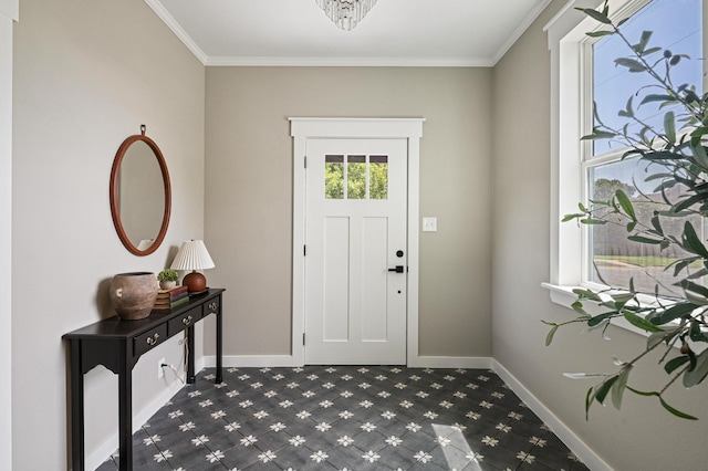 entryway with ornamental molding and carpet flooring