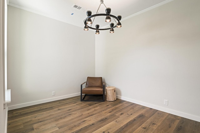 unfurnished room featuring a notable chandelier and dark hardwood / wood-style floors